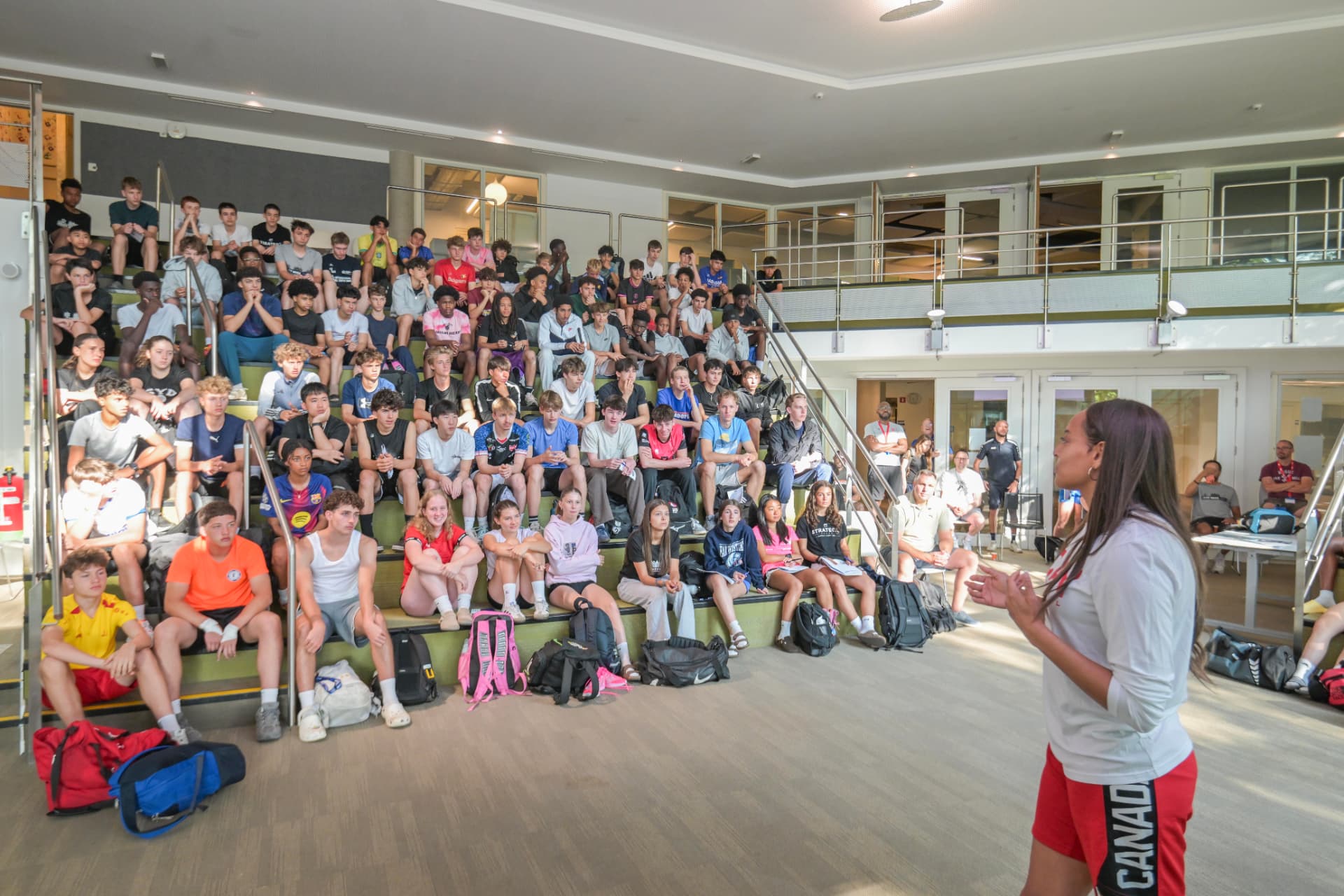 Guest speaker addressing Elite Week athletes