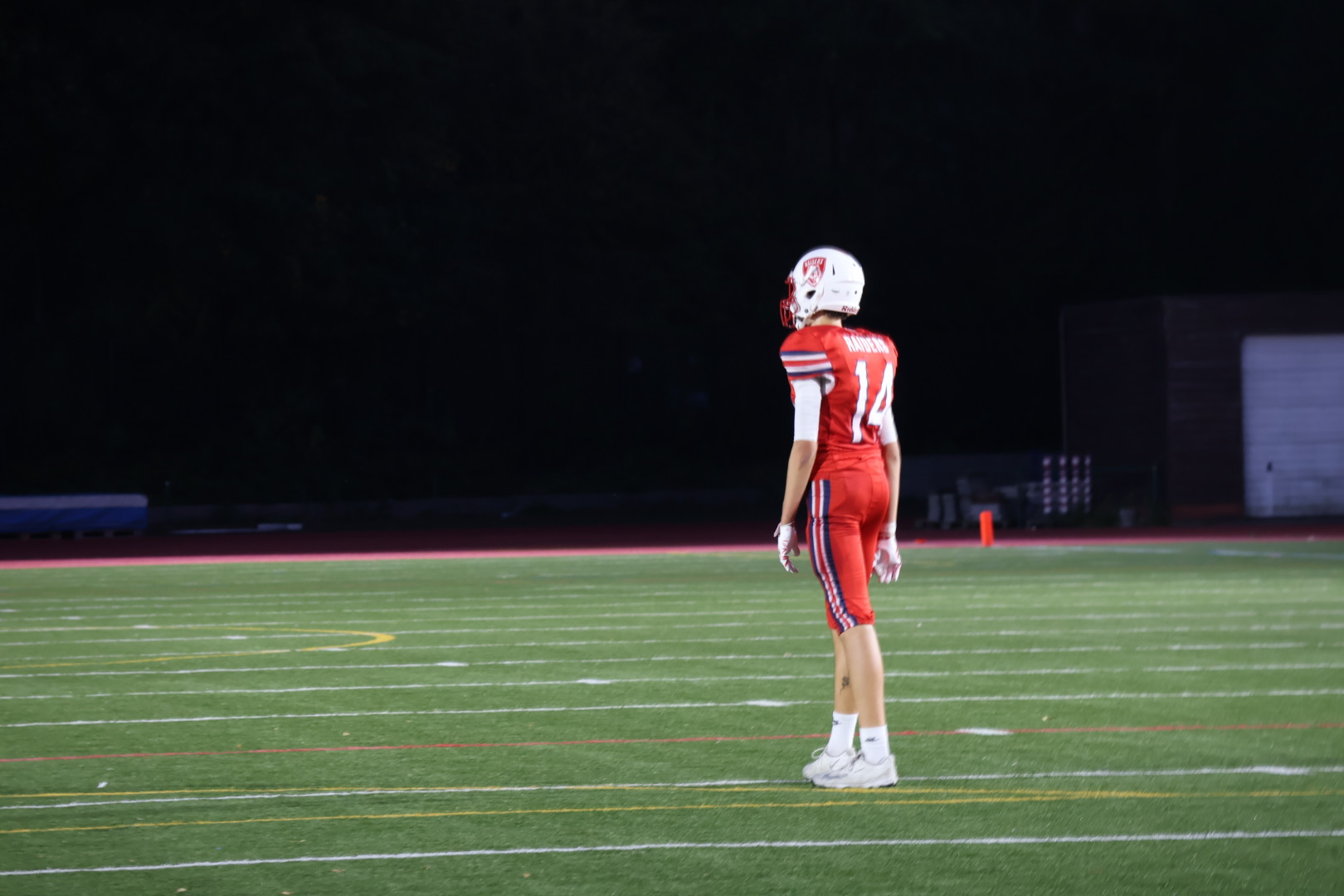 Raiders player under the home field lights