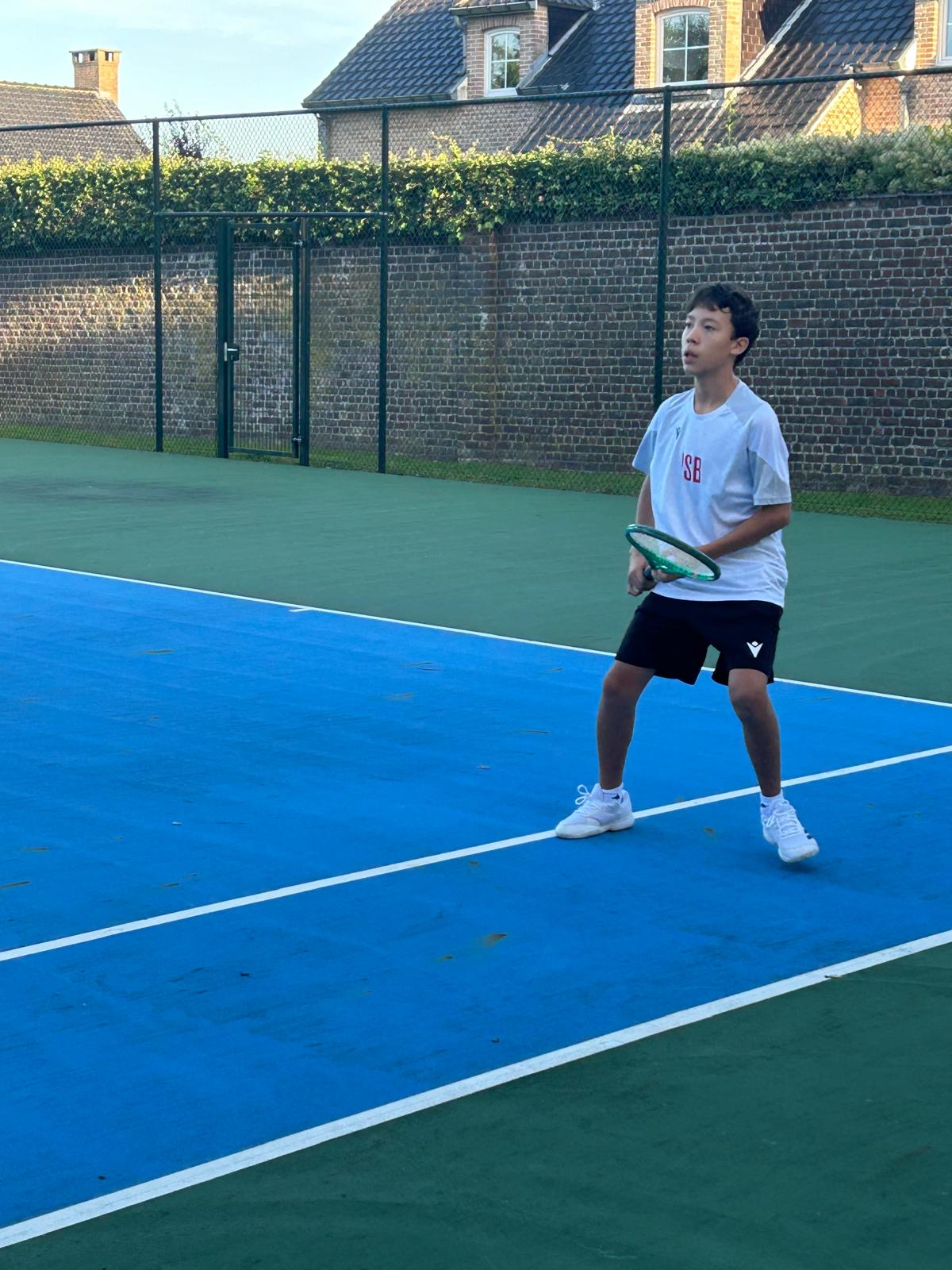U14 Tennis With a few wins at St. John's over the weekend