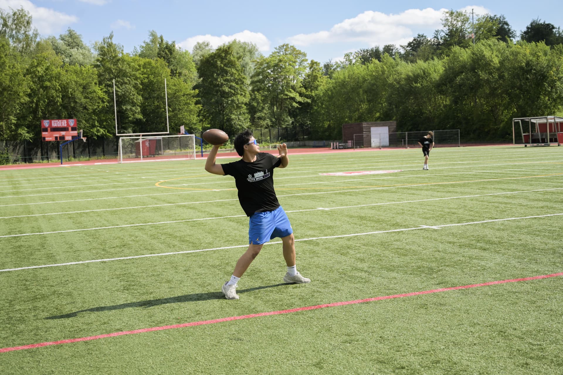 Quarterback rolling out on the turf