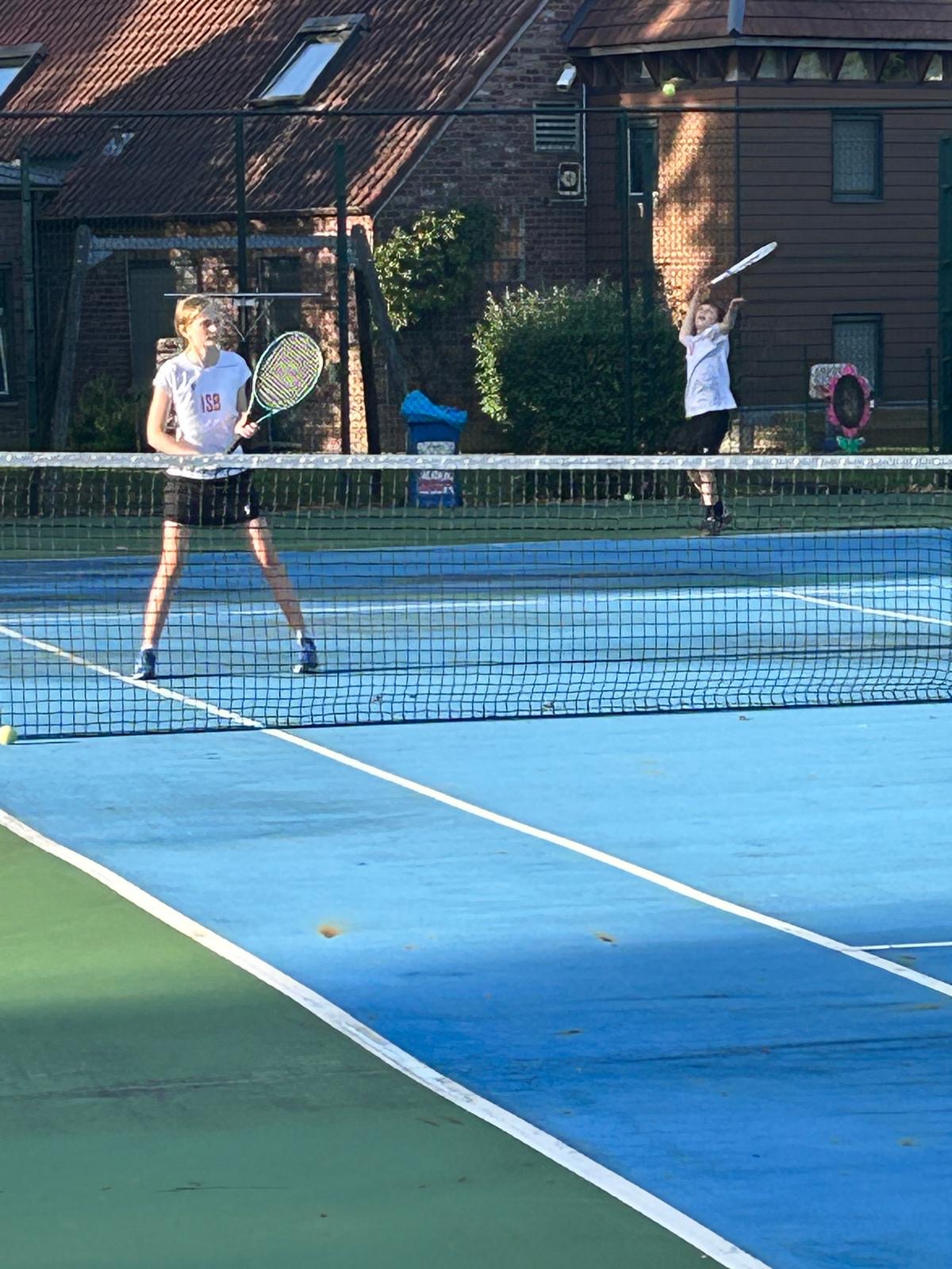 U14 Tennis With a few wins at St. John's over the weekend