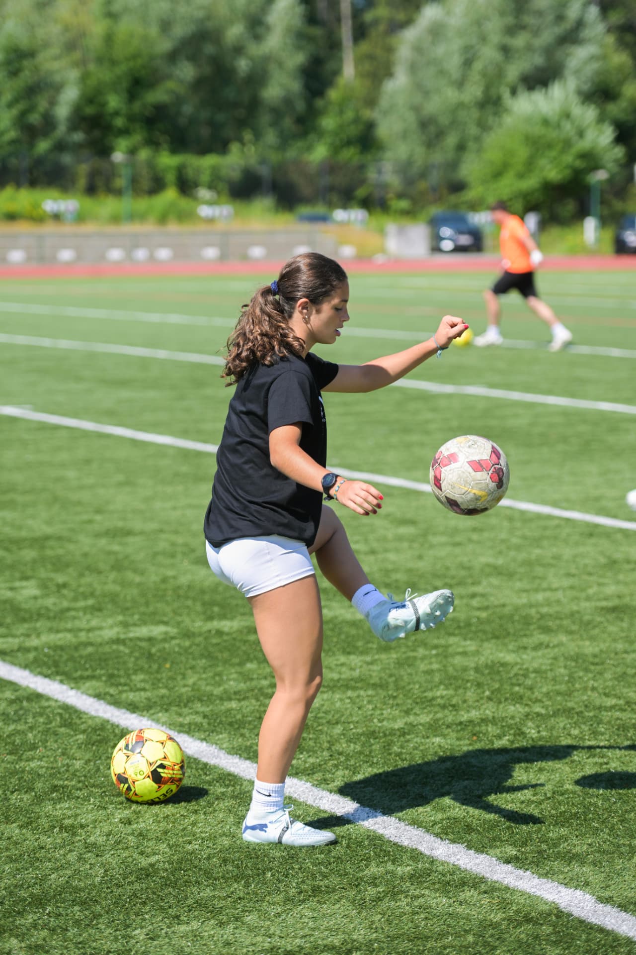 Juggling and first-touch work on the sideline