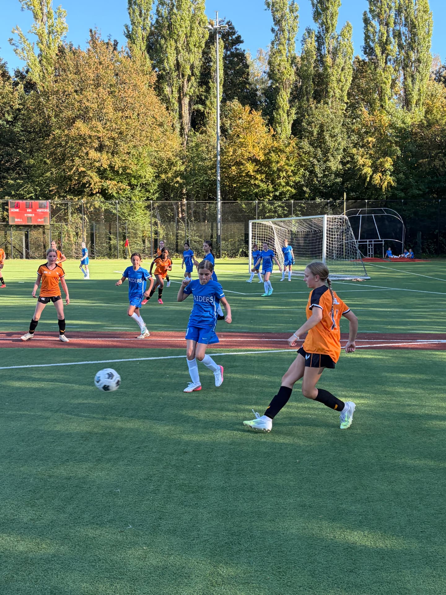 U14 girls soccer players in action