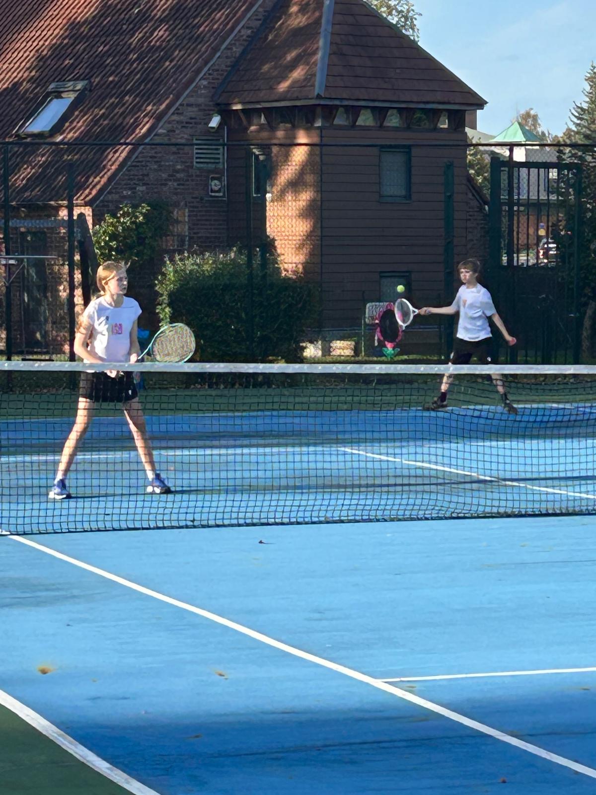 U14 Tennis With a few wins at St. John's over the weekend