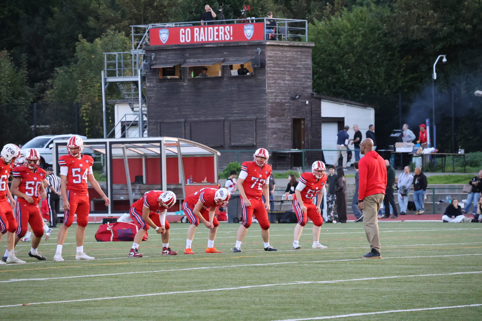 Raiders Football warming up against SHAPE