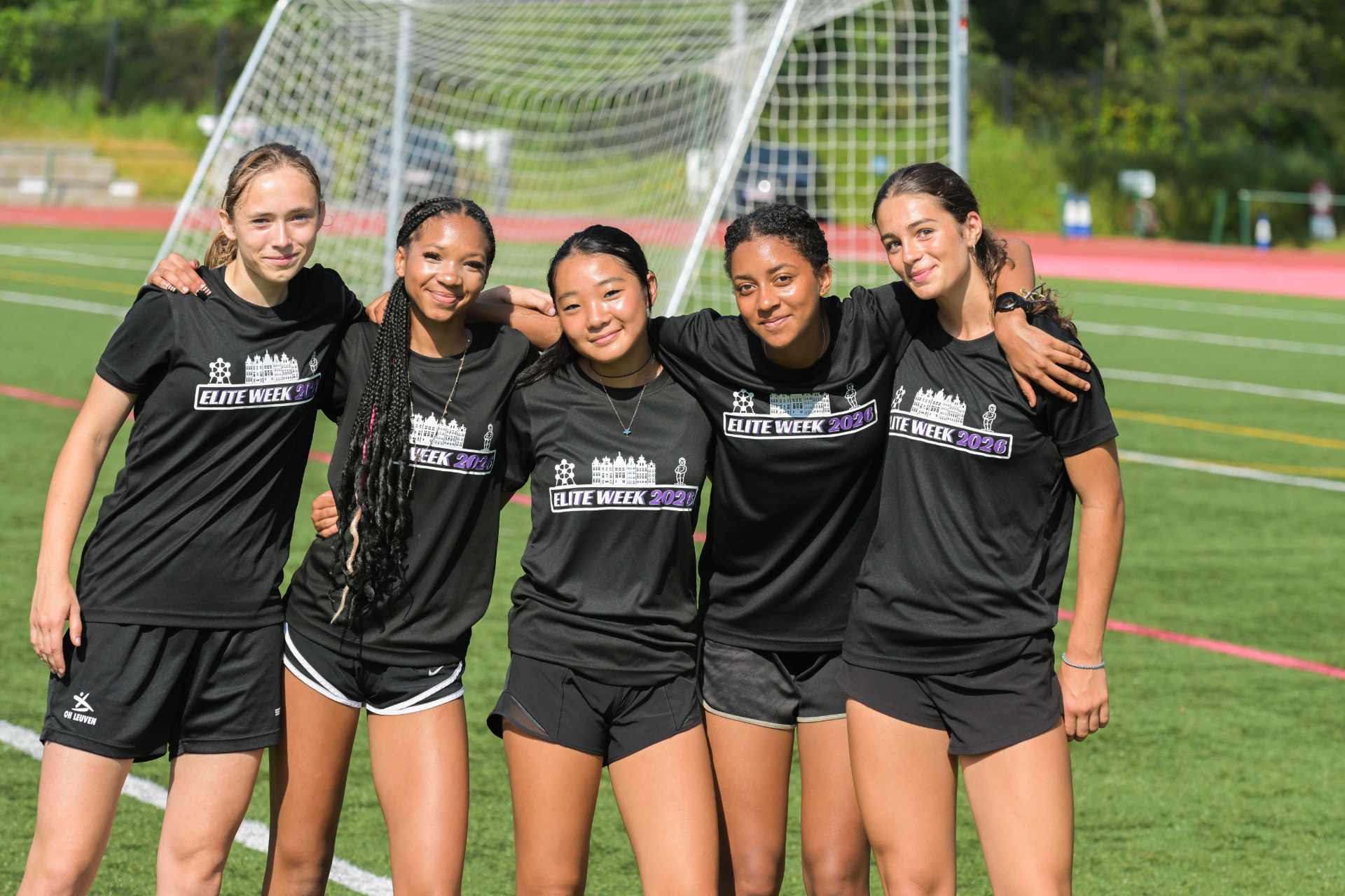 Elite Week soccer athletes together on the ISB field