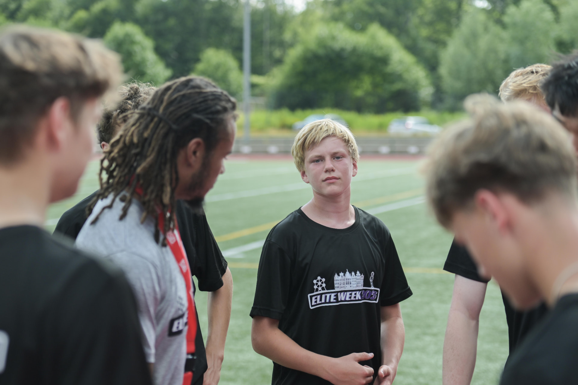 Coaching huddle between drills